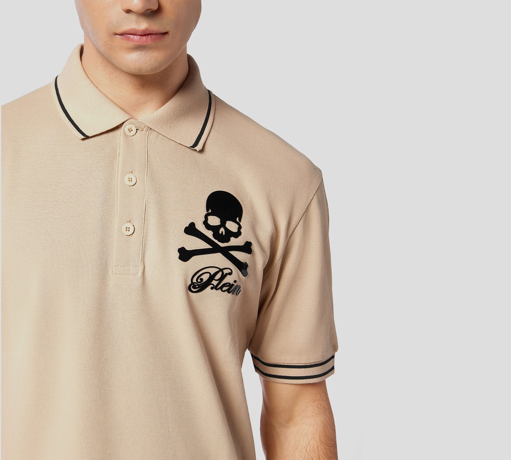 Philipp Plein - POLO BEIGE DE PIQUÉ CON CALAVERA Y HUESOS