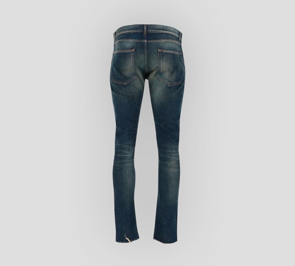 Saint Laurent - SKINNY JEANS CON PRELAVADO Y RUEDOS RASGADOS